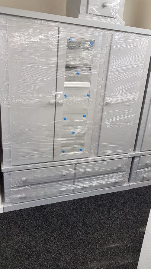 Click Here To Enlarge This Photo Of pine 3 door 4 drawer wardrobe.